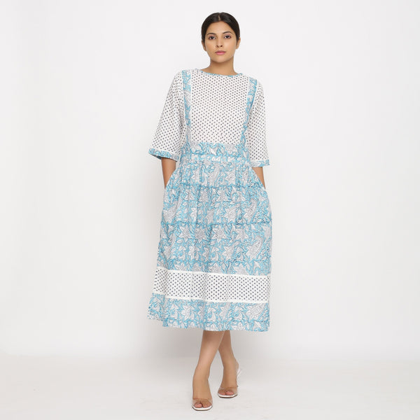 Front View of a Model wearing Turquoise Block Printed Cotton Midi Dress