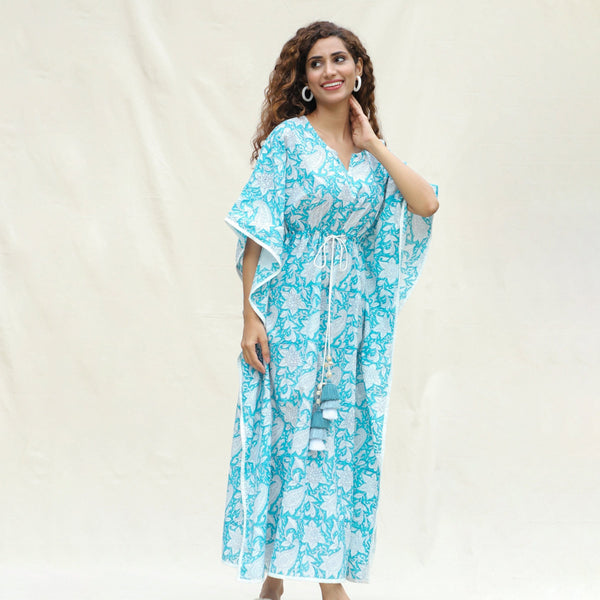 Front Detail of a Model wearing Turquoise Floral Block Printed Cotton Ankle Length Kaftan Dress