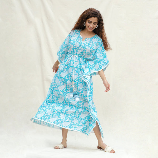 Front View of a Model wearing Turquoise Floral Block Printed Cotton Ankle Length Kaftan Dress