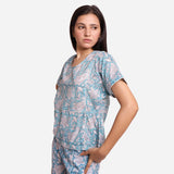 Left View of a Model wearing Turquoise Paisley Cotton Block Print Top