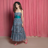 Left View of a Model wearing Twirly Teal Chanderi Block Print Layer Dress