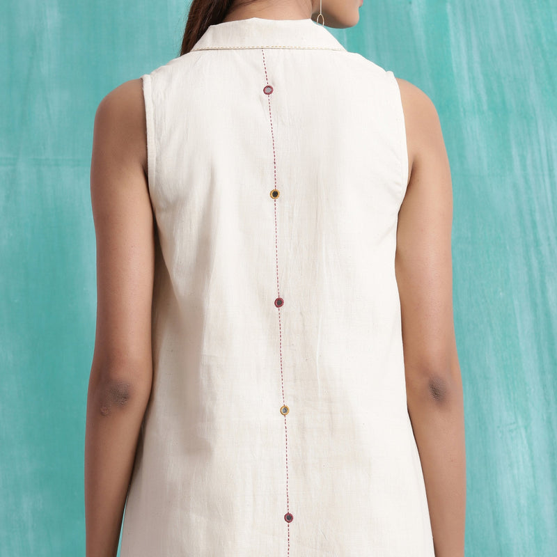 Back Detail of a Model wearing Off-White Handspun Cotton Muslin Button-Down Short Dress