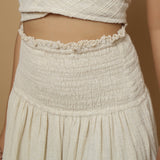 Front Detail of a Model wearing Undyed Cotton Flax Frilled Skirt