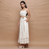 Left View of a Model wearing Undyed Cotton Jute Laced Flared Skirt