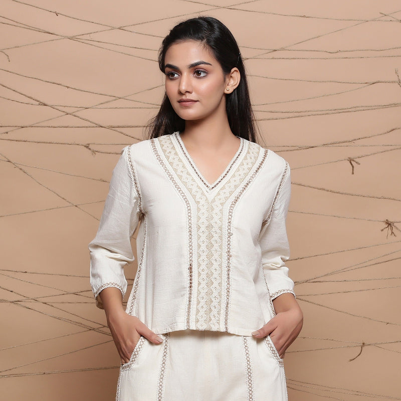 Front View of a Model wearing Undyed V-Neck Jute Laced Straight Top