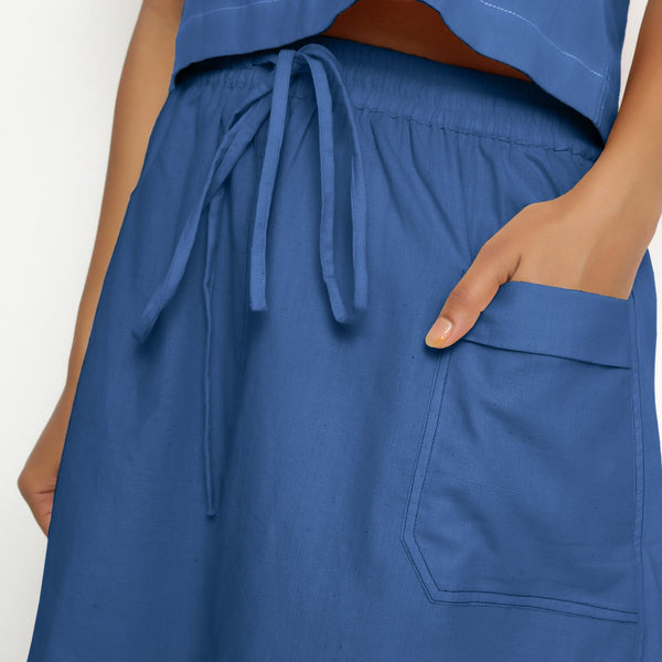 Front Detail of a Model wearing Vegetable-Dyed Blue 100% Cotton Mid-Rise Skirt