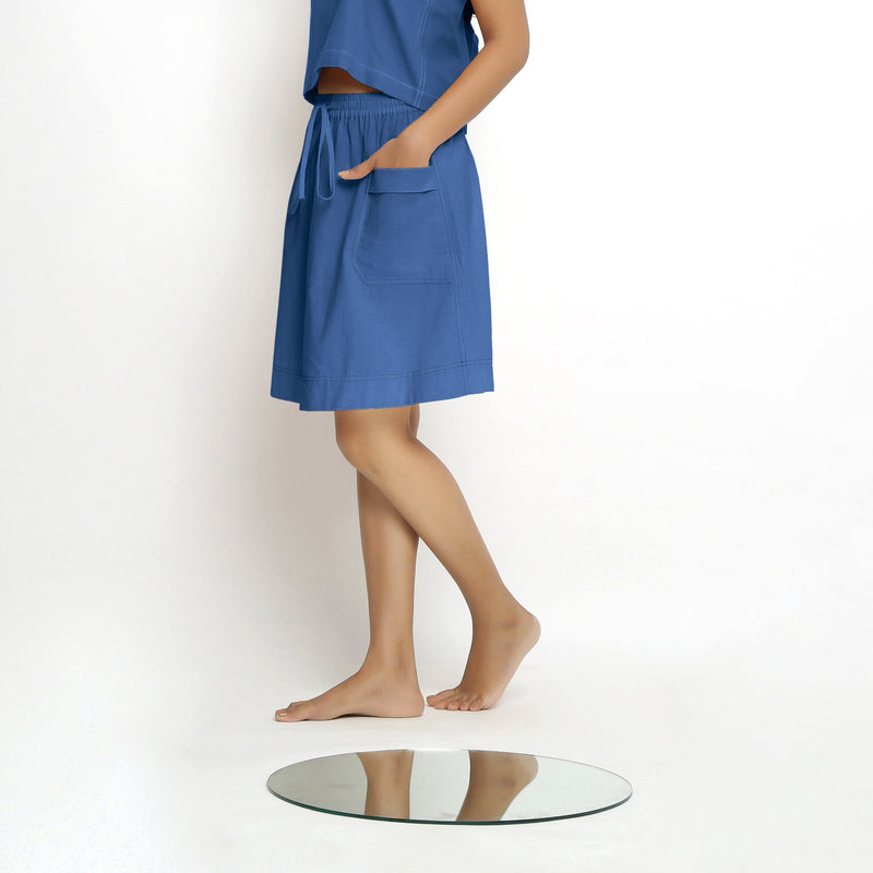 Left View of a Model wearing Vegetable-Dyed Blue 100% Cotton Mid-Rise Skirt