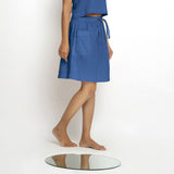 Right View of a Model wearing Vegetable-Dyed Blue 100% Cotton Mid-Rise Skirt
