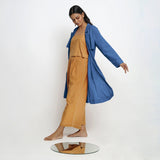 Left View of a Model wearing Vegetable Dyed Blue Paneled Cotton Overlay