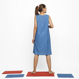 Back View of a Model wearing Vegetable Dyed Handspun Cotton Blue A-Line Knee-Length Dress