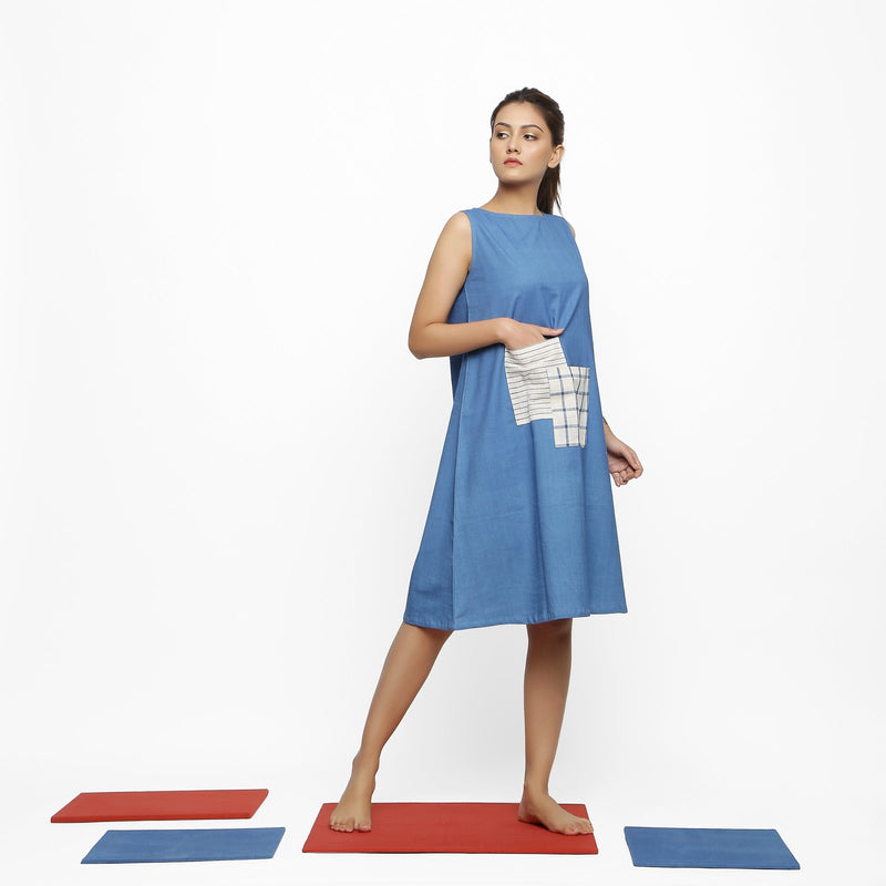 Right View of a Model wearing Vegetable Dyed Handspun Cotton Blue A-Line Knee-Length Dress