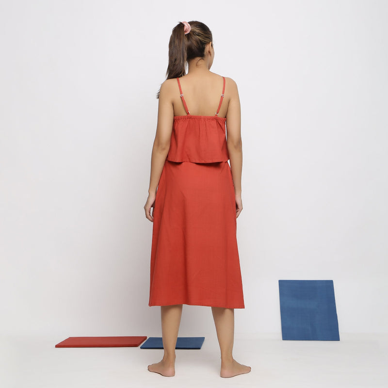 Back View of a Model wearing Brick Red Vegetable Dyed Handspun Cotton Button-Down Midi Skirt
