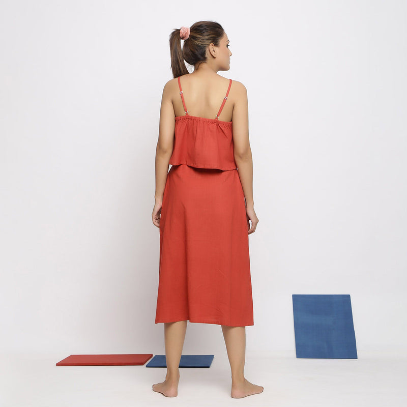 Back View of a Model wearing Vegetable Dyed Brick Red Spaghetti Top