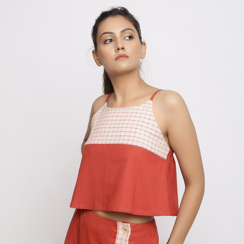 Left View of a Model wearing Vegetable Dyed Brick Red Spaghetti Top