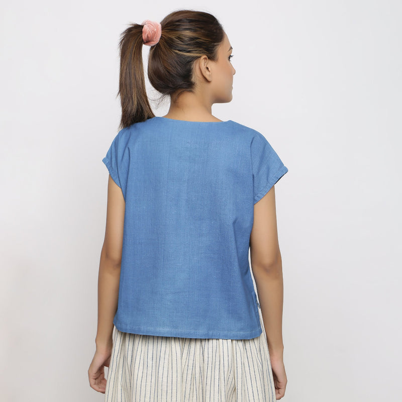 Back View of a Model wearing Blue Vegetable Dyed Handspun Cotton V-Neck High-Low Top
