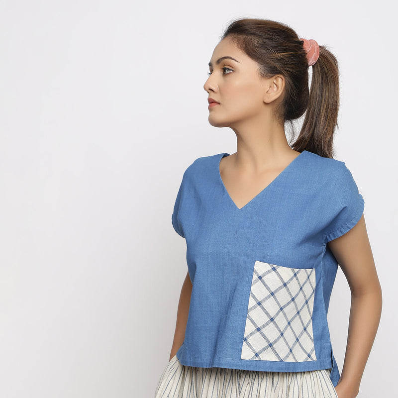Front View of a Model wearing Blue Vegetable Dyed Handspun Cotton V-Neck High-Low Top