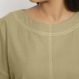 Front Detail of a Model wearing Vegetable-Dyed Green 100% Cotton Top