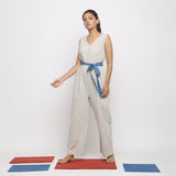 Front View of a Model wearing Ecru and Blue Striped Vegetable Dyed Cotton Sleeveless Jumpsuit