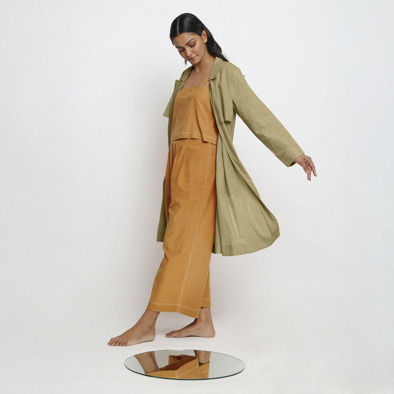 Left View of a Model wearing Vegetable-Dyed Khaki Green 100% Cotton Paneled Overlay