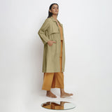 Right View of a Model wearing Vegetable-Dyed Khaki Green 100% Cotton Paneled Overlay