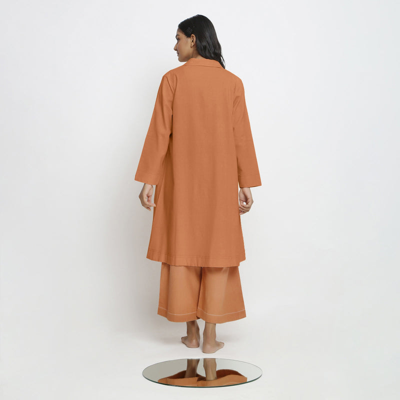 Back View of a Model wearing Vegetable-Dyed Khaki Orange 100% Cotton Paneled Overlay