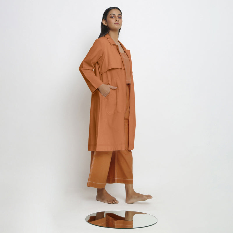 Right View of a Model wearing Vegetable-Dyed Khaki Orange 100% Cotton Paneled Overlay