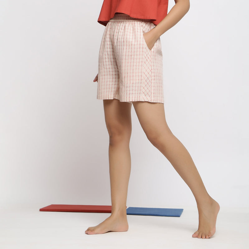 Left View of a Model wearing Off-White and Pink Checks Yarn-Dyed Cotton Paneled Shorts