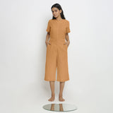 Front View of a Model wearing Vegetable Dyed Orange 100% Cotton Mid-Rise Culottes