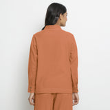 Back View of a Model wearing Vegetable Dyed Orange Button-Down Top
