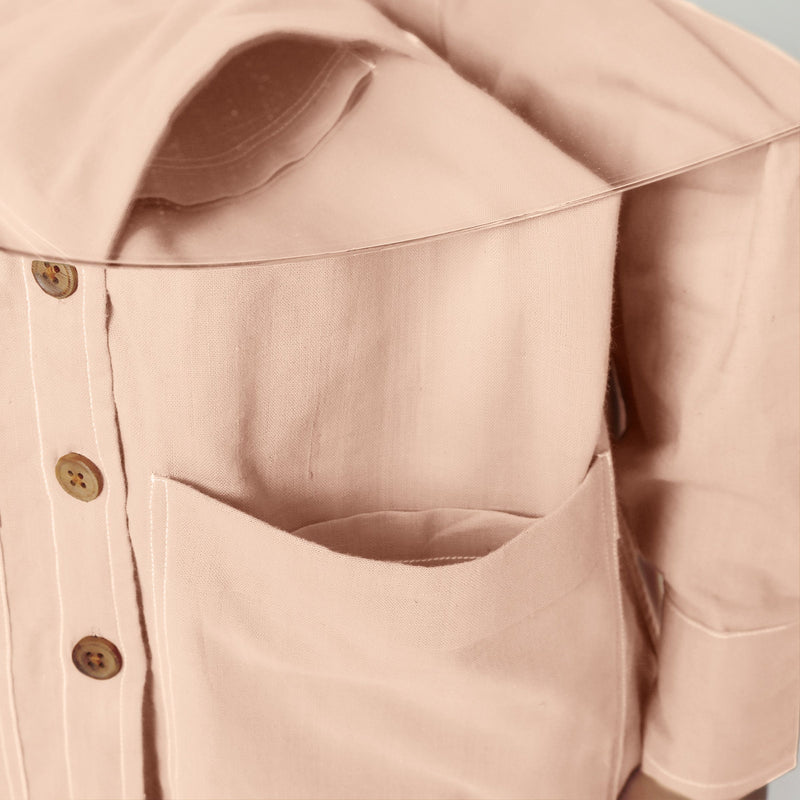 Front Detail of a Model wearing Vegetable Dyed Pink Button-Down Outerwear