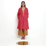 Front View of a Model wearing Vegetable Dyed Red Paneled Cotton Overlay