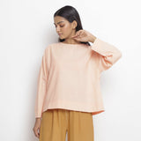 Front View of a Model wearing Powder Pink Vegetable Dyed Straight Fit Top