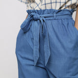 Front Detail of a Model wearing Blue Vegetable Dyed Cotton Paperbag Elasticated Wide Legged Pant
