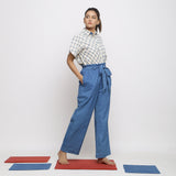 Right View of a Model wearing Blue Vegetable Dyed Cotton Paperbag Elasticated Wide Legged Pant