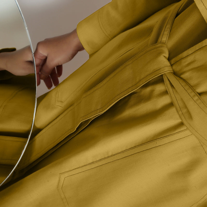 Close View of a Model wearing Vegetable-Dyed Yellow 100% Cotton Paneled Overlay