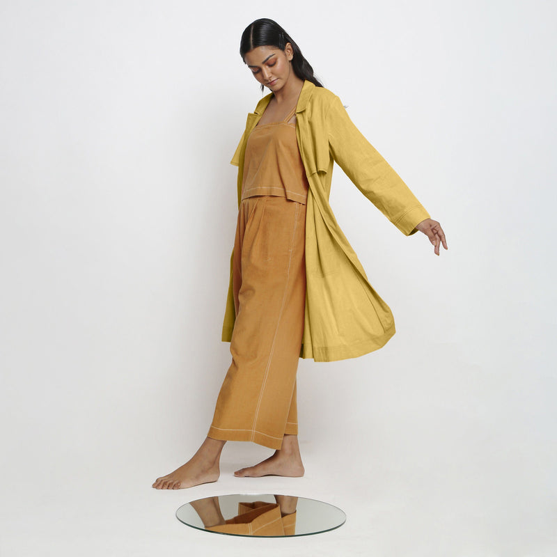Left View of a Model wearing Vegetable-Dyed Yellow 100% Cotton Paneled Overlay