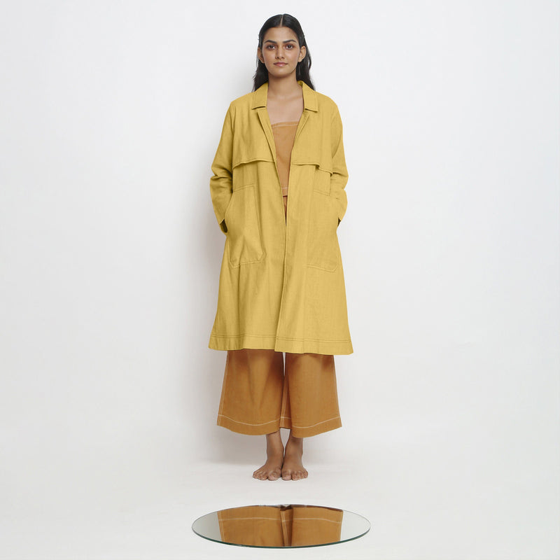 Front View of a Model wearing Vegetable-Dyed Yellow 100% Cotton Paneled Overlay