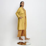Right View of a Model wearing Vegetable-Dyed Yellow 100% Cotton Paneled Overlay