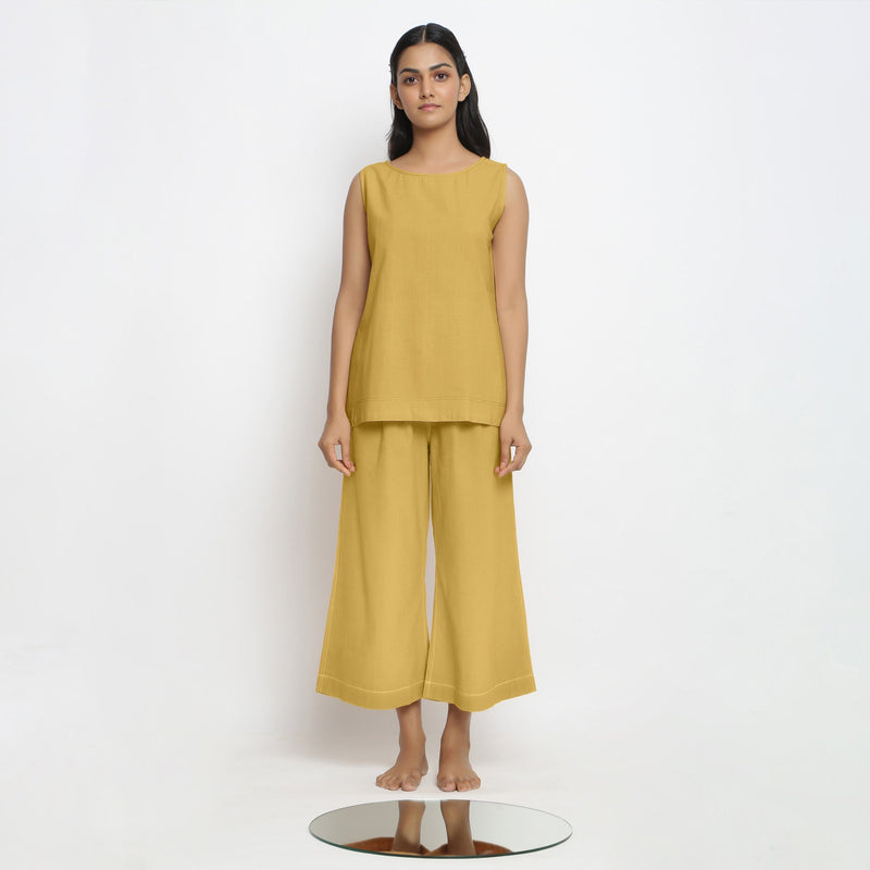 Front View of a Model wearing Vegetable Dyed yellow Boat Neck A-Line Top