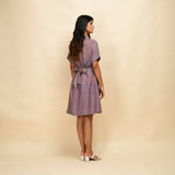 Back View of a Model wearing Vintage Plum 100% Cotton Knee Length Blouson Dress