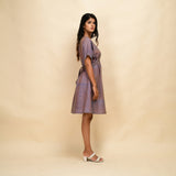 Right View of a Model wearing Vintage Plum 100% Cotton Knee Length Blouson Dress