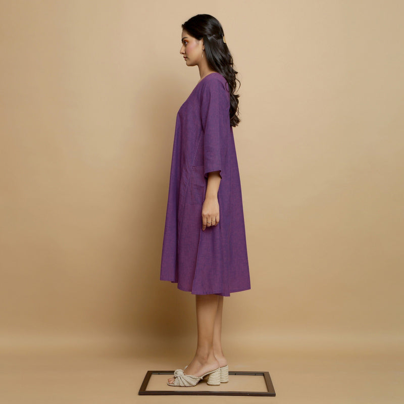 Left View of a Model wearing Violet Flared Knee Length Cotton Dress