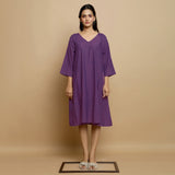 Front View of a Model wearing Violet Flared Knee Length Cotton Dress