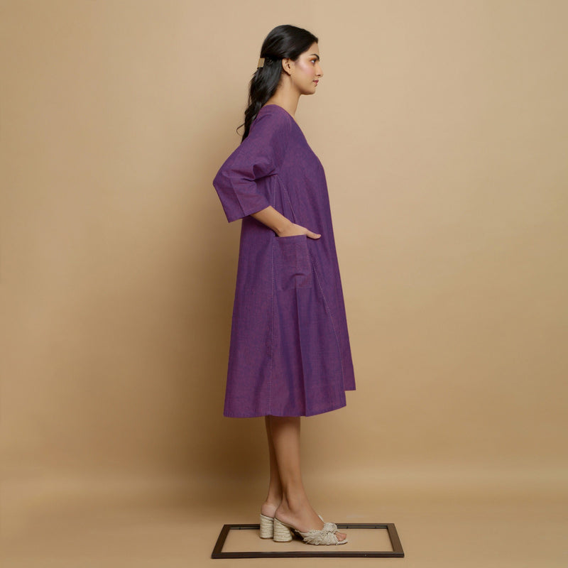 Right View of a Model wearing Violet Flared Knee Length Cotton Dress