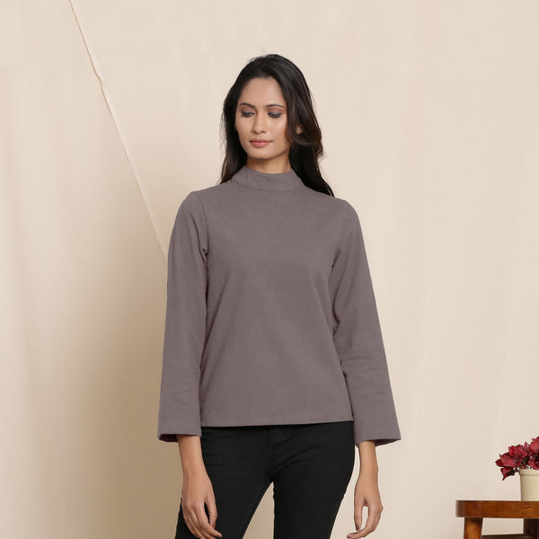 Front View of a Model wearing Warm Ash Grey Turtleneck Straight Top