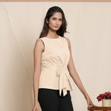 Right View of a Model wearing Warm Beige A-Line Cotton Top