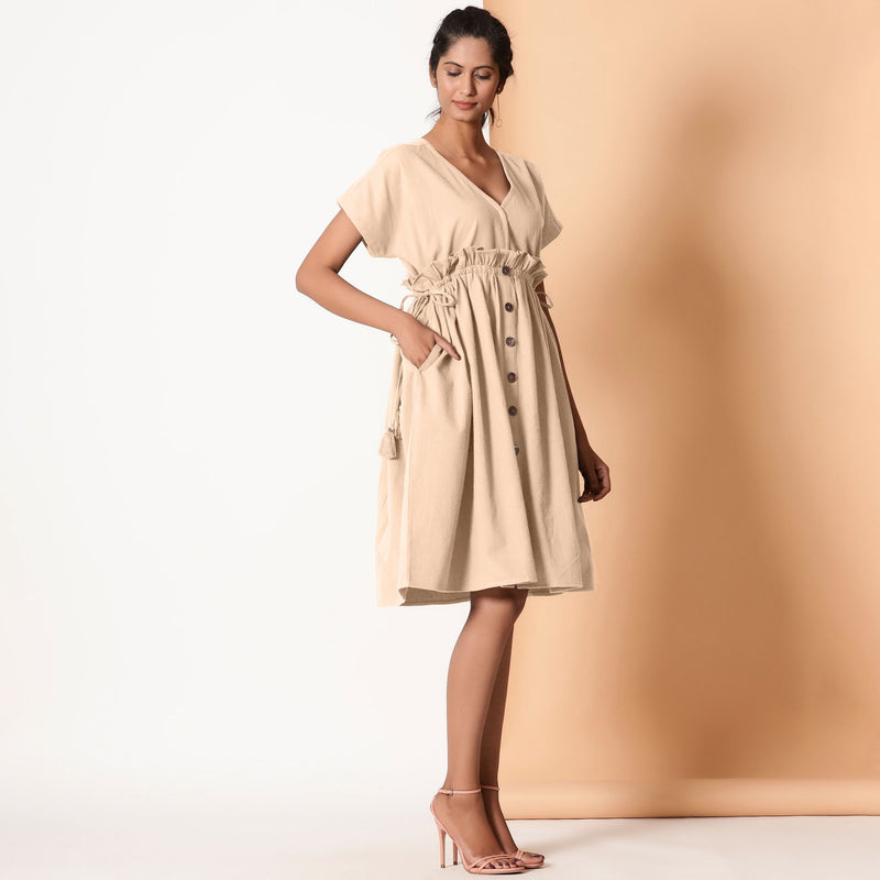 Right View of a Model wearing Beige Warm Cotton Flannel Knee Length Frilled Dress