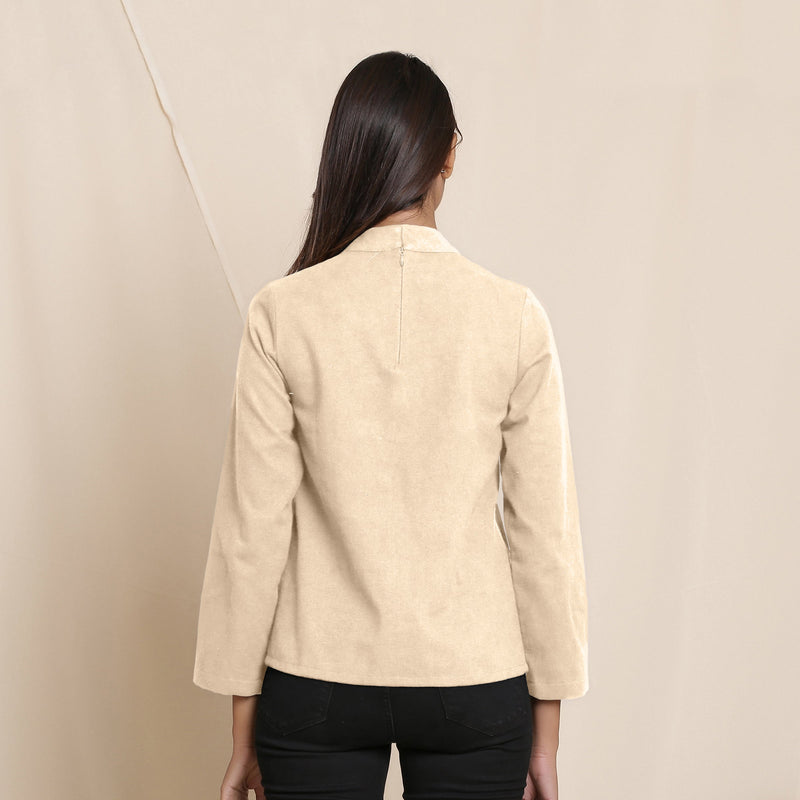Back View of a Model wearing Warm Beige Turtle Neck Straight Top