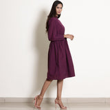Right View of a Model wearing Berry Wine Warm Cotton Fit Knee Length Fit and Flare Dress