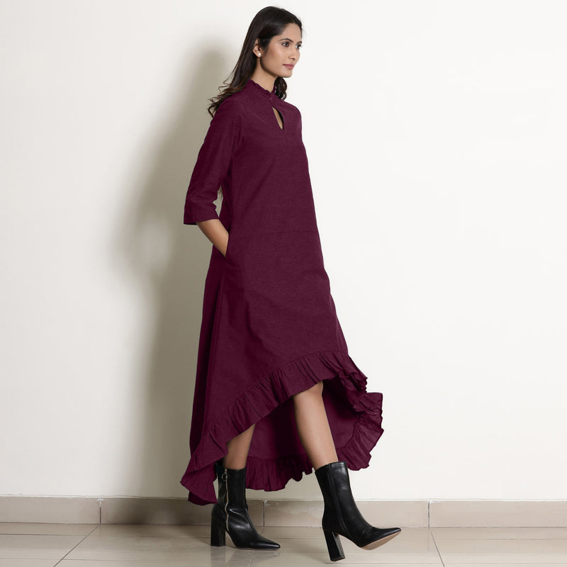 Right View of a Model wearing Warm Berry Wine Frilled Neck High Low Dress